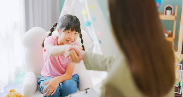 istock Asian psychologist hold patent hand 2187718228