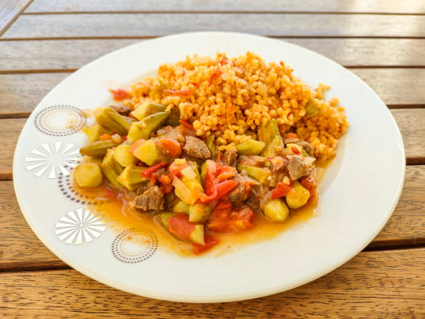 Having traditional turkish wheat bulgur with okra casserole dish at mugla turkey