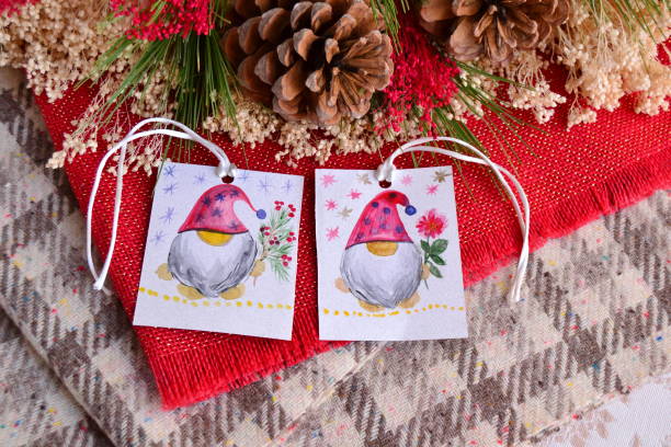 istock Christmas gnomes gift tags mockup copy space pine tree red mistletoe berries watercolor painting 2187721036