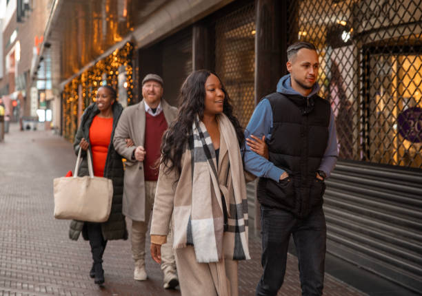 istock Two beautiful mixed race couples on a weekend city trip 2187722587
