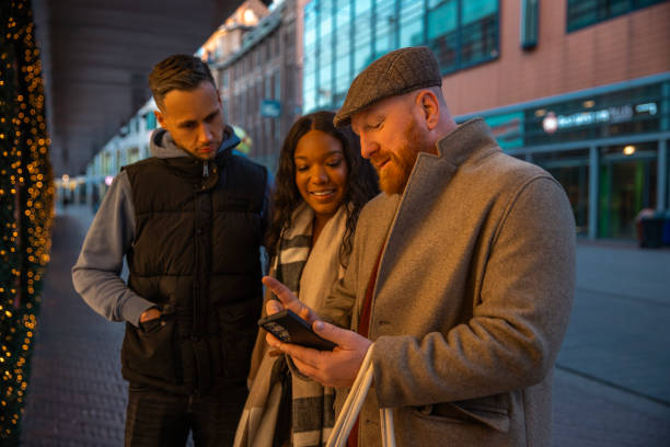 istock Two beautiful mixed race couples on a weekend city trip 2187722643
