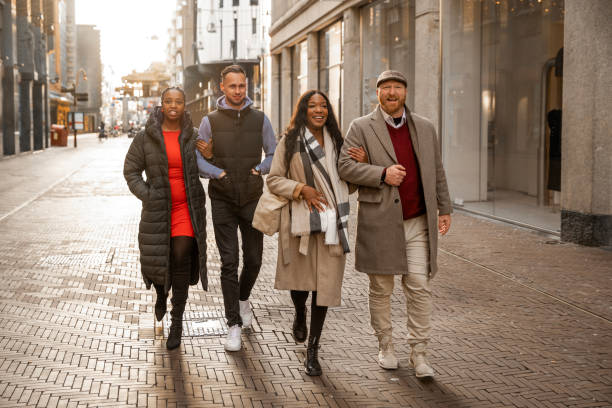 istock Two beautiful mixed race couples on a weekend city trip 2187722848