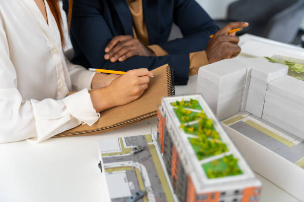 istock Colleagues working together on the project in the architect office 2187722864