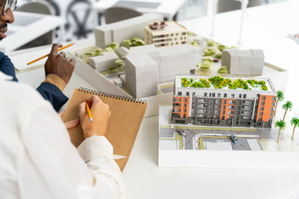 istock Colleagues working together on the project in the architect office 2187722903