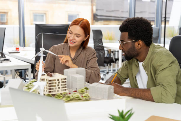 istock Colleagues working in the office and developing a new sustainable project 2187723062