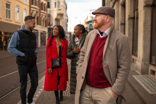 istock Two beautiful mixed race couples on a weekend city trip 2187723511
