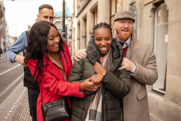 istock Two beautiful mixed race couples on a weekend city trip 2187723600