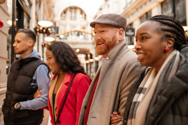 istock Two beautiful mixed race couples on a weekend city trip 2187723601