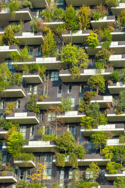 istock Vertical forest building with lush greenery and trees integrated into modern architecture, Milan, Italy. Vertical garden and landscaping, innovative architecture, urban sustainability 2187727424