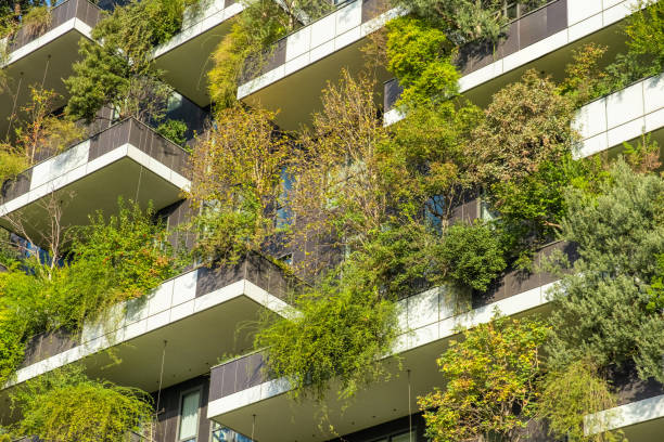 istock Close up of vertical forest building with lush greenery and trees integrated into modern architecture, Milan, Italy. Vertical garden and landscaping, innovative architecture, urban sustainability 2187727756
