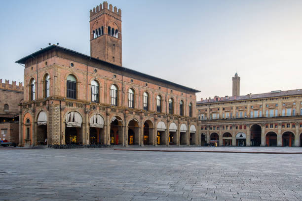 istock Piazza Maggiore in Bologna old town, Emilia Romagna, Italy, featuring historic architecture, arched colonnades, and the iconic Palazzo del Podesta at sunrise with nobody. Travel destination in Europe 2187728120