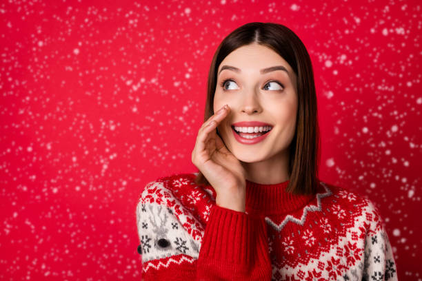 istock Photo of charming pretty woman dressed print pullover arm lips making announcement looking empty space isolated red color background 2187728225