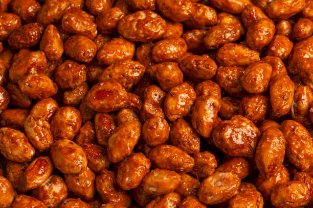 istock Tasty sweet roasted peanuts as a background. 2187732152
