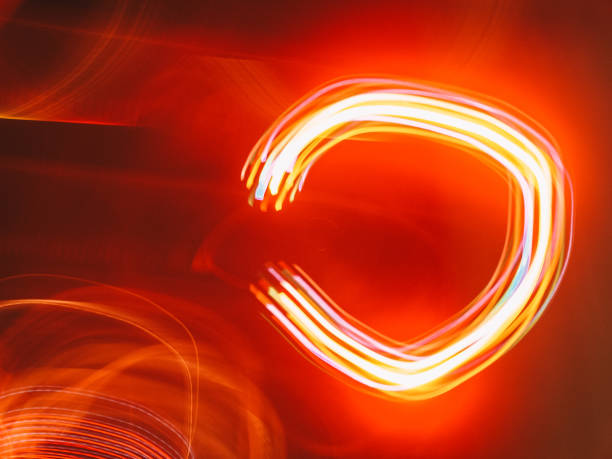 istock A red and blue light show with a red background 2187739672