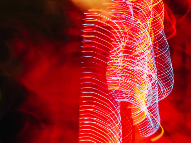 istock A red and blue light show with a red background 2187739694