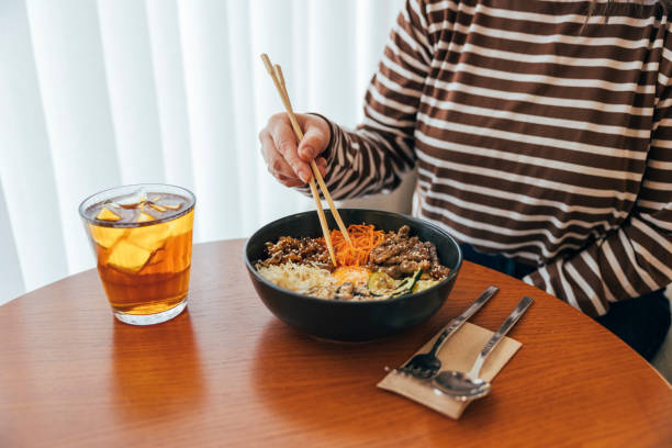 istock Close up, Woman eating bibimbap 2187739829