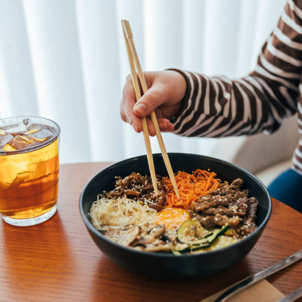 Close up, Woman eating bibimbap