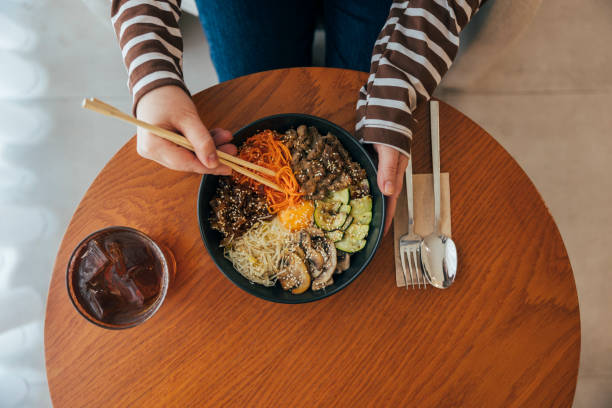 Close up, Woman eating bibimbap