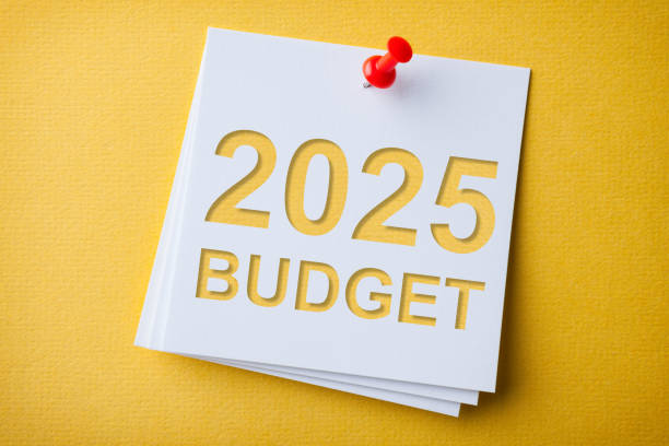 istock Budget 2025 Word in White Sticky Note on Yellow Chardboard Background 2187742760
