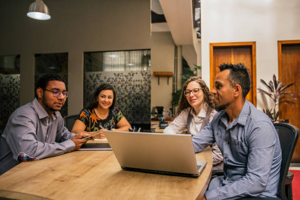 istock Employees meeting about a project in a modern office 2187745127