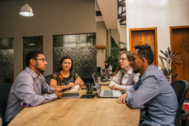 istock Employees meeting about a project in a modern office 2187745138