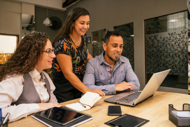 istock Employees meeting about a project in a modern office 2187745254