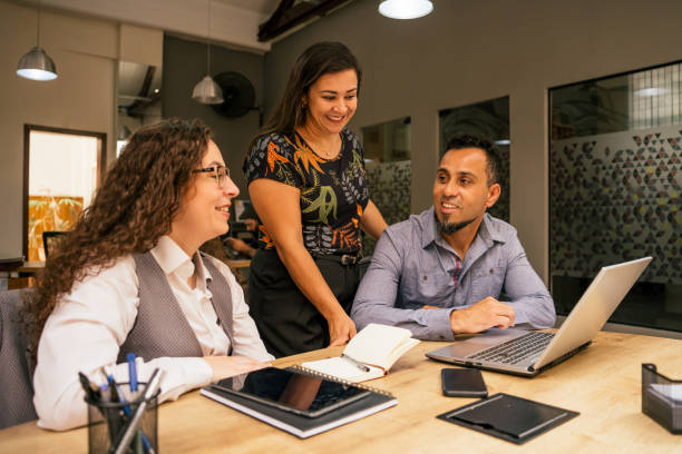 istock Employees meeting about a project in a modern office 2187745259