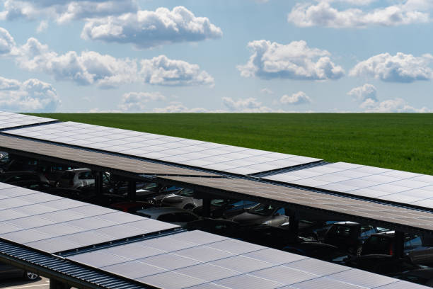 istock Solar canopy. Parking space with solar panels on a roof 2187746129