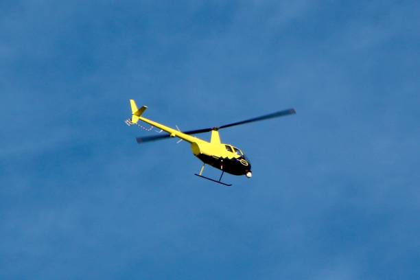 istock Yellow and black helicopter 2187747298