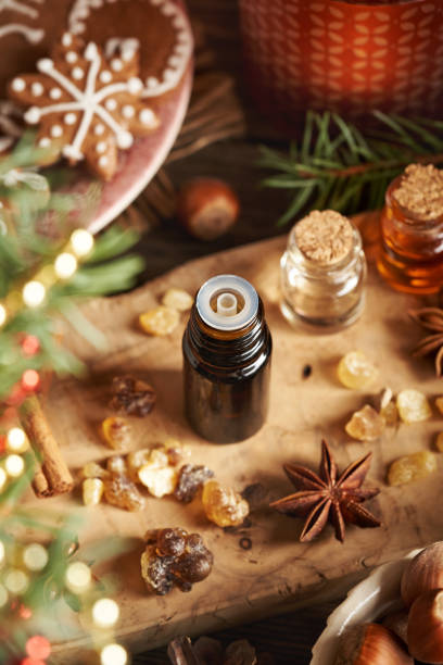 istock Christmas essential oils with frankincense resin, spruce tree, cinnamon and star anise 2187752767