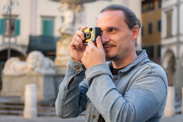 istock Tourist photographer shooting disposable camera 2187754885