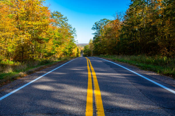 istock Highway 107 going through a colorful Wisconsin forest in early October 2187755993