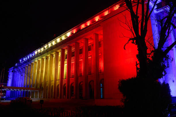 Mogosoaia, Romania. 1st Dec, 2024: Victoria Palace, the seat of the Romanian Government, is illuminated in the colors of the Romanian flag on the occasion of Romania's National Day.