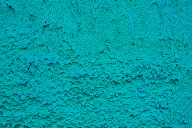 Relief, rough plaster painted with green paint.
