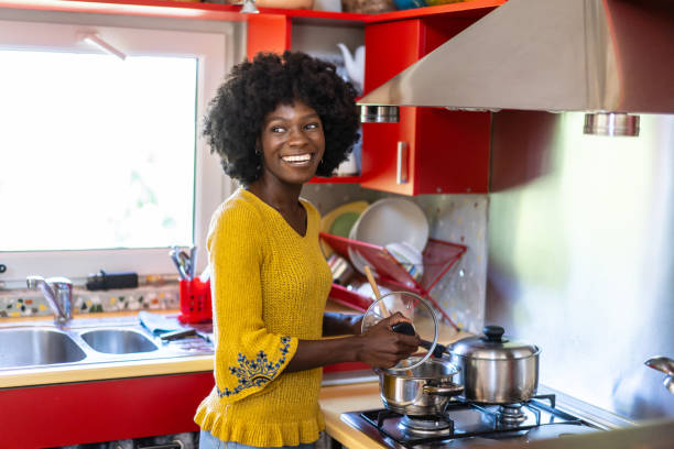 istock Woman cooking in her apartment 2187766028