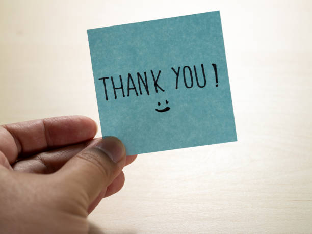 istock Thank you note gesture expressing gratitude in a personal indoor environment 2187766413