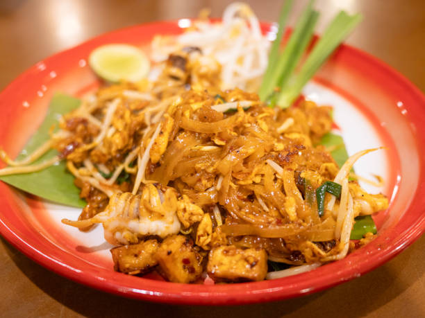 istock Savoring authentic pad thai local restaurant food cozy setting close-up culinary delight 2187768049