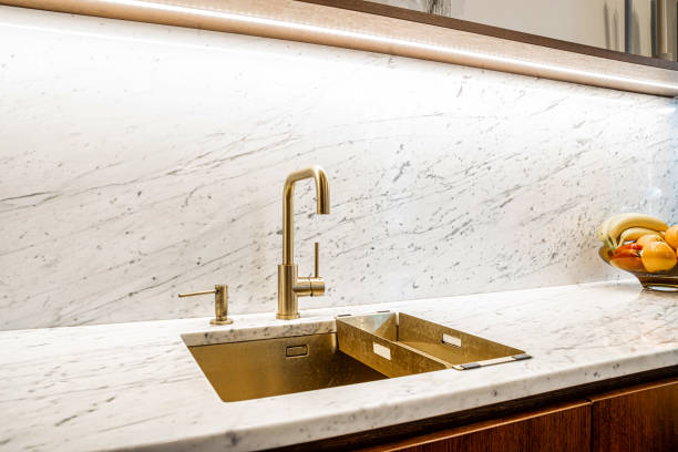 Modern Kitchen Countertop with Marble Finish and Gold Accents