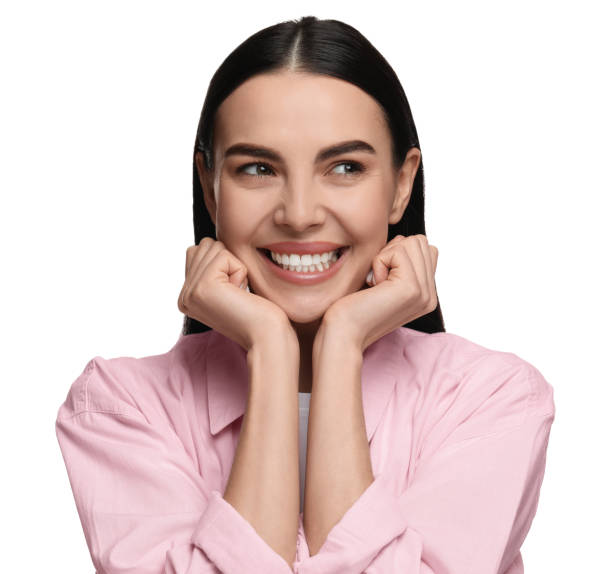 istock Beautiful woman with clean teeth smiling on white background 2187774117
