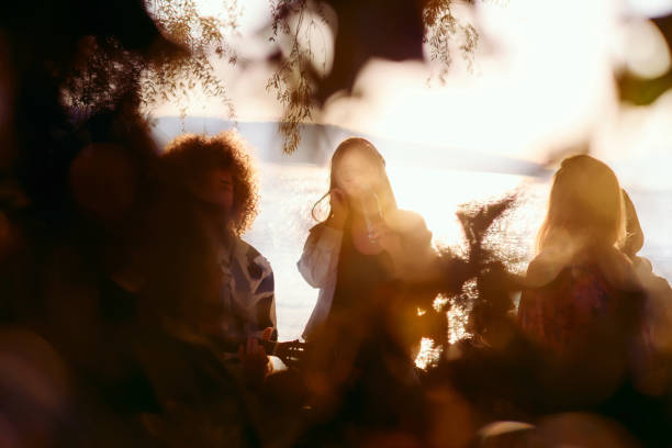 People having a good time at sunset