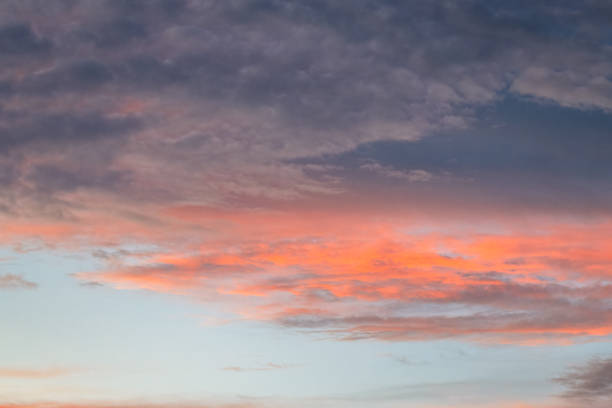 istock Sunset with beautiful rain clouds drifting across the sky 2187779432