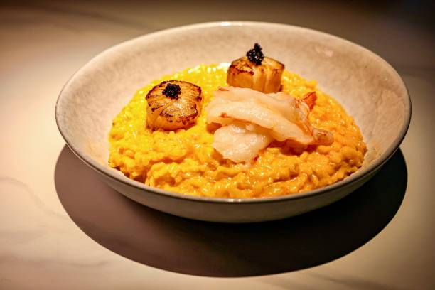 istock Scallops and Lobster on Saffron Risotto 2187780893