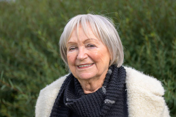 istock Elderly Woman with a Warm Smile in a Natural Setting 2187783664