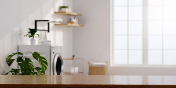 istock A 3D render of a bright modern laundry room featuring eco-friendly features and natural elements, showcasing trends in sustainable home design. 2187783683