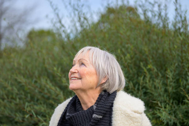istock Elderly Woman Gazing Upwards with a Smile 2187783706