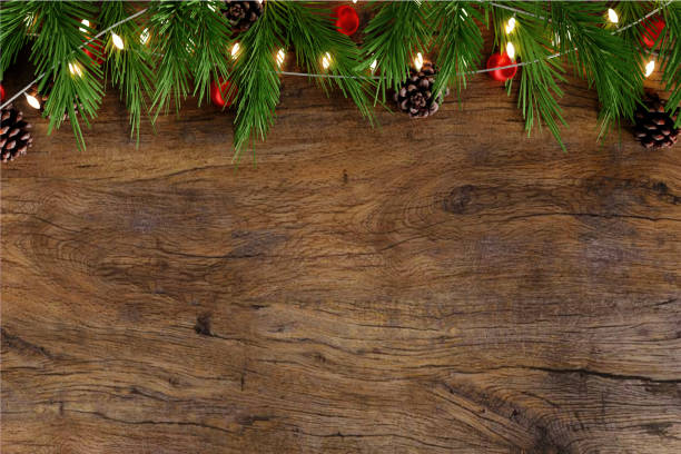 istock Festive Christmas Garland on Rustic Wood Background 3D Render. 2187783801