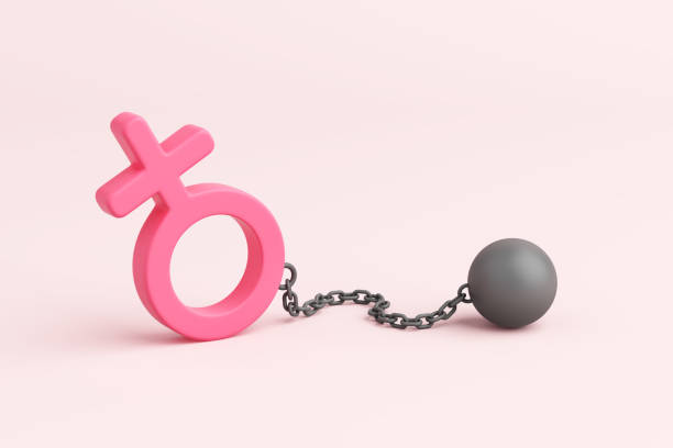 istock Pink female gender symbol object chained with pendulum on a light pink background. Concept of confinement, broken heart, sadness, heartache. Copy space. Clipping path. 3D Illustration. 2187785022