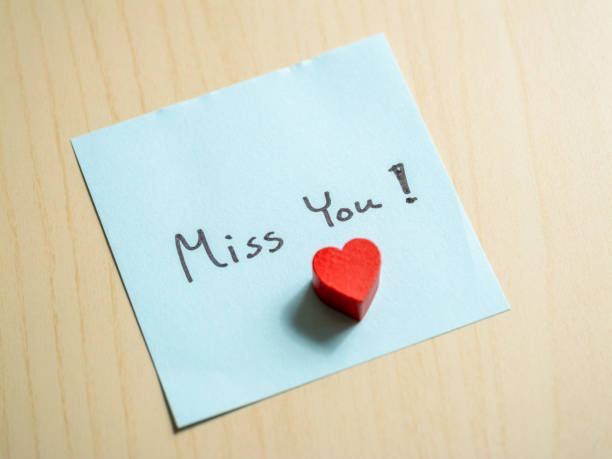 istock Miss you note home personal message indoor close-up sentimental gesture 2187785705
