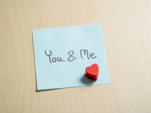 istock Romantic gesture you & me note on desk personal space memo intimate heartfelt message 2187785863