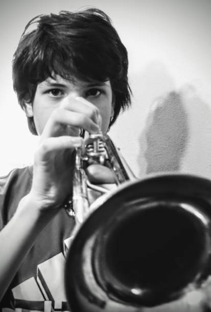 istock Black and white trumpet player 2187785967